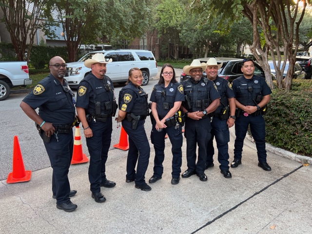 Group of officers standing and posing at an event
